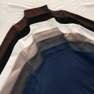 neutral-toned fine ribbed turtleneck tops in assorted colours