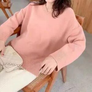 salmon-pink oversized crew-neck knit jumper