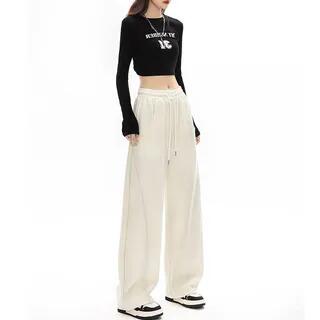 Mid Rise Plain Wide Leg Pants Almond by Dovitade
