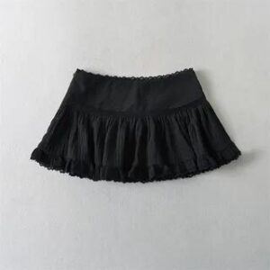 Pleated Mini Skirt: Creating Balance Through Silhouette pleated mini skirt fashion styling inspiration