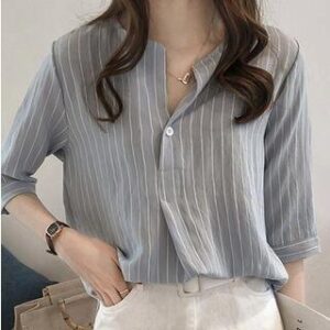 pale-blue vertical-striped relaxed collared shirt
